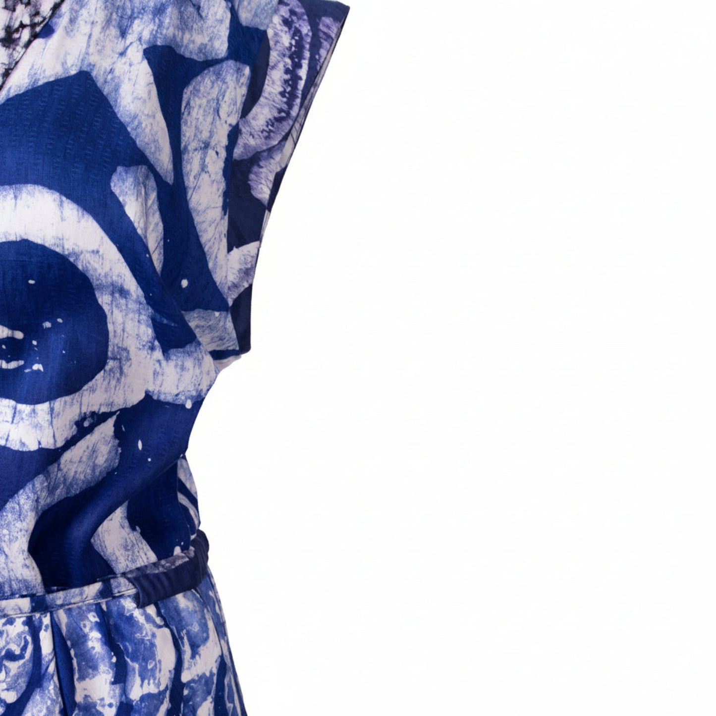 Blue and white patterned fabric with a white background