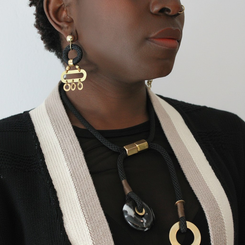 Close up image of the sheer mesh top underneath the cardigan on a model, plus the Pichulik accessories up close.