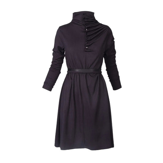 A dark charcoal black ribbed knit dress with a high gathered mock neck, long sleeves, and a matching waist belt.