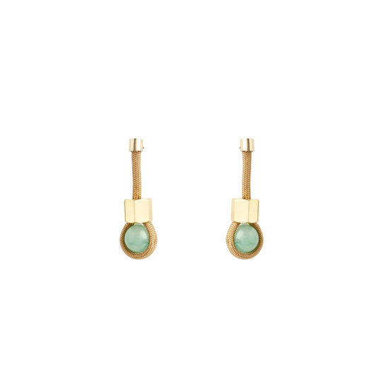 Pair of earrings with gold and green elements on a white background