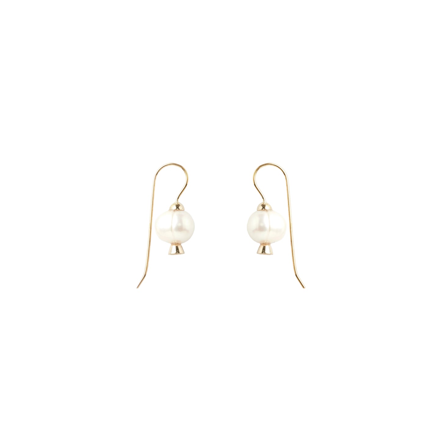 Pair of pearl earrings on a light background