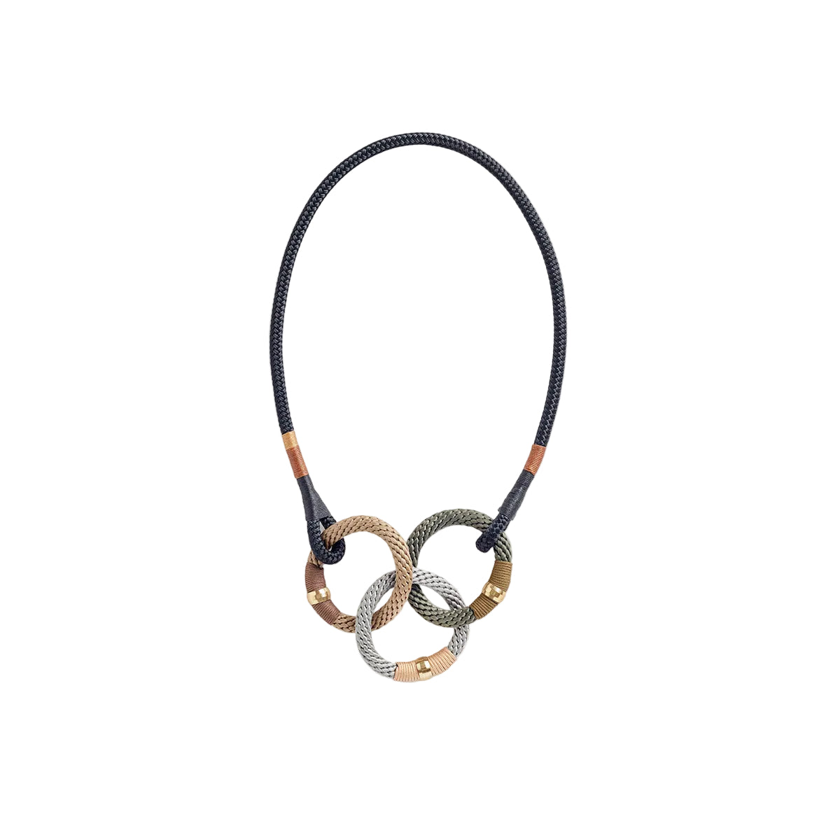 A black rope necklace with brass end clasps and multiple brass rings linked in the center.