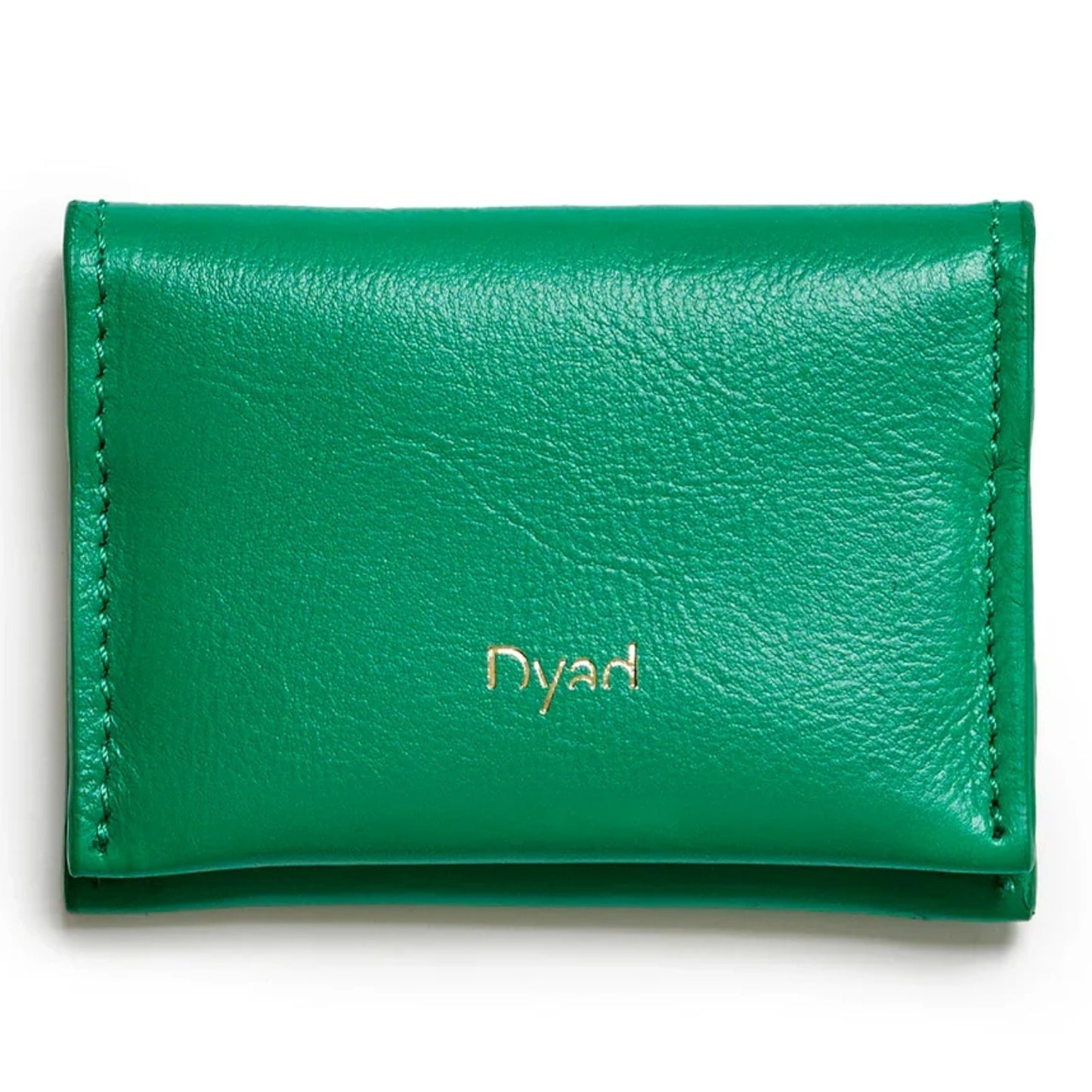 A green pebbled leather card holder wallet with gold foil 'Dyad' branding.