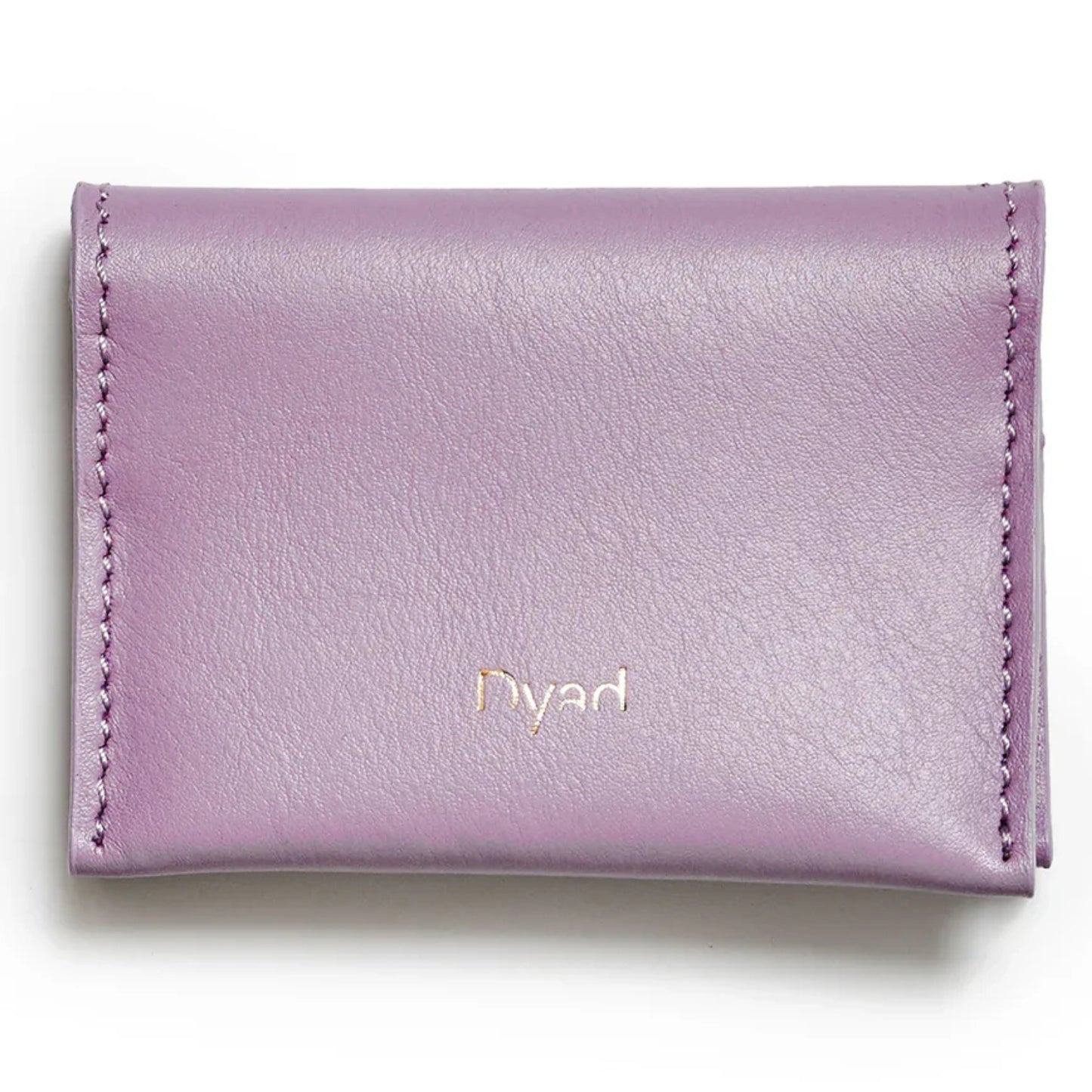 A lavender purple leather card holder wallet with gold-embossed 'Dyad' branding.