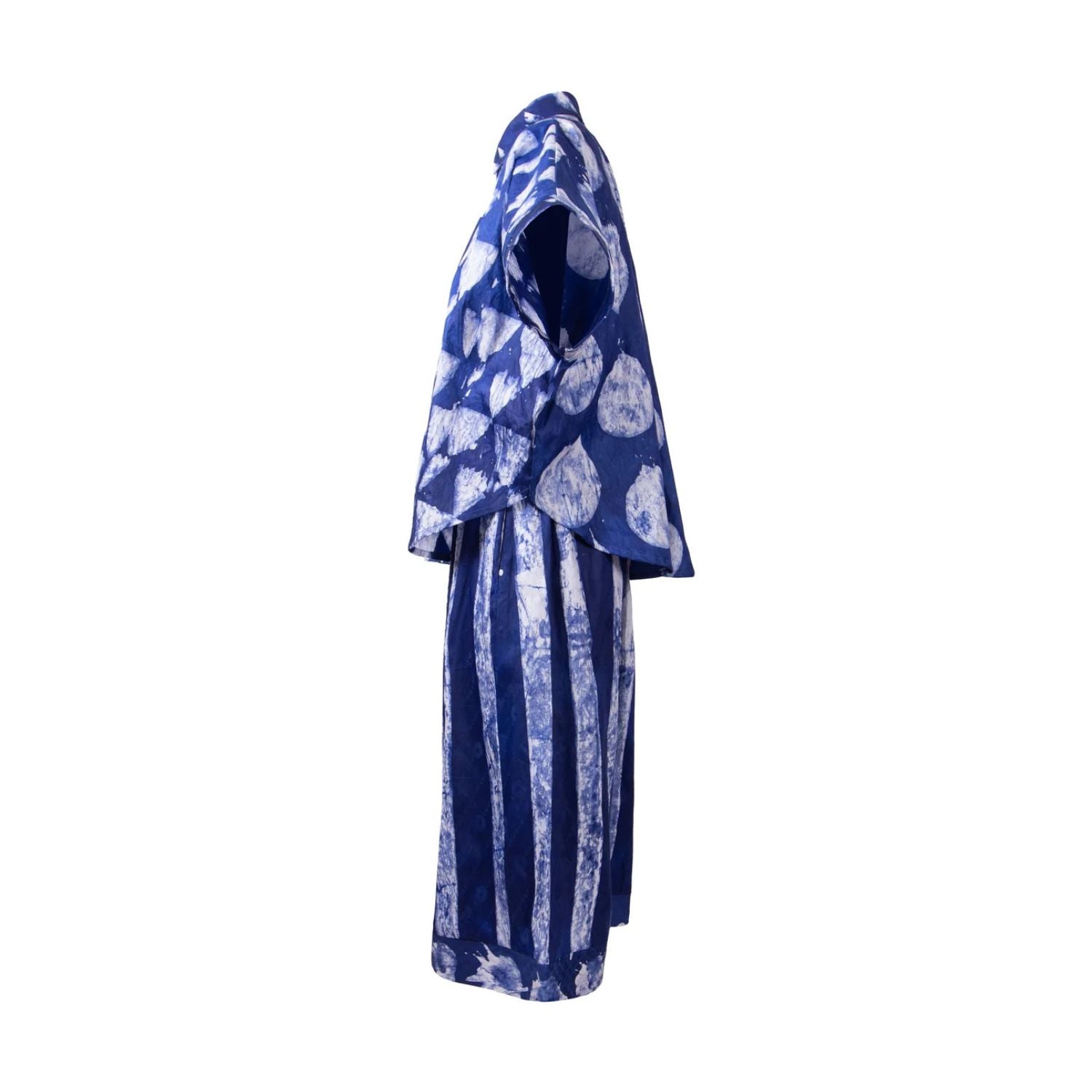 A blue and white patterned dress displayed on a headless mannequin against a plain white background.