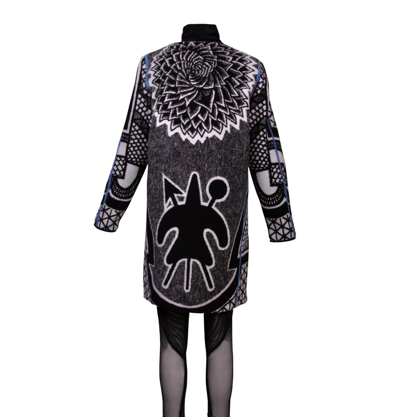 A long-sleeve black and white patterned coat displayed on a mannequin against a plain white background. The garment features a large black and white spiral mandala design on the back and a stylized black figure with white outline on the lower back.