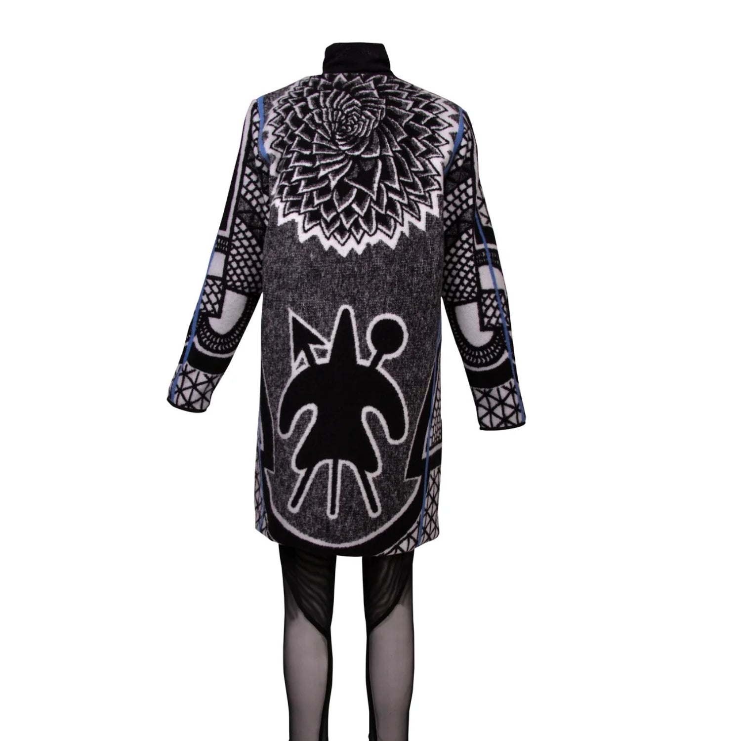 A long-sleeve black and white patterned coat displayed on a mannequin against a plain white background. The garment features a large black and white spiral mandala design on the back and a stylized black figure with white outline on the lower back.
