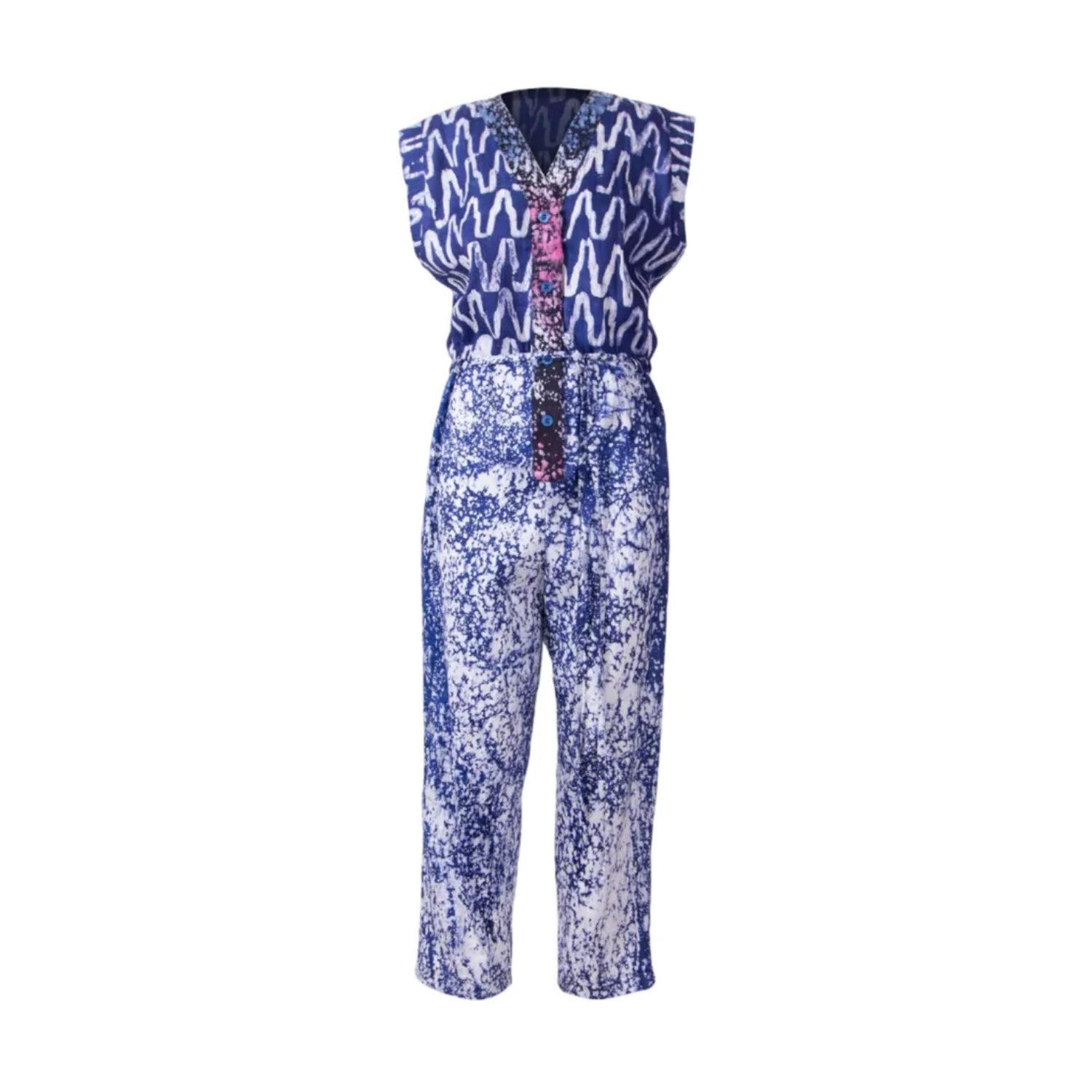 A sleeveless jumpsuit featuring a blue and white wavy pattern on the top and a blue and white abstract print on the pants, with a decorative beaded front detail.