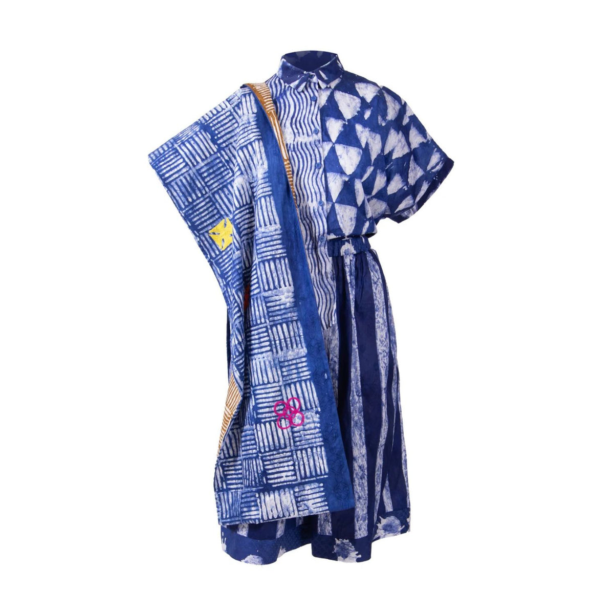 A blue and white patterned shirt with a high collar, short sleeves, and elastic waist belt pants and a scarf with Adinkra Ghanian Symbols embroidered on in different colours, shown on a plain white background