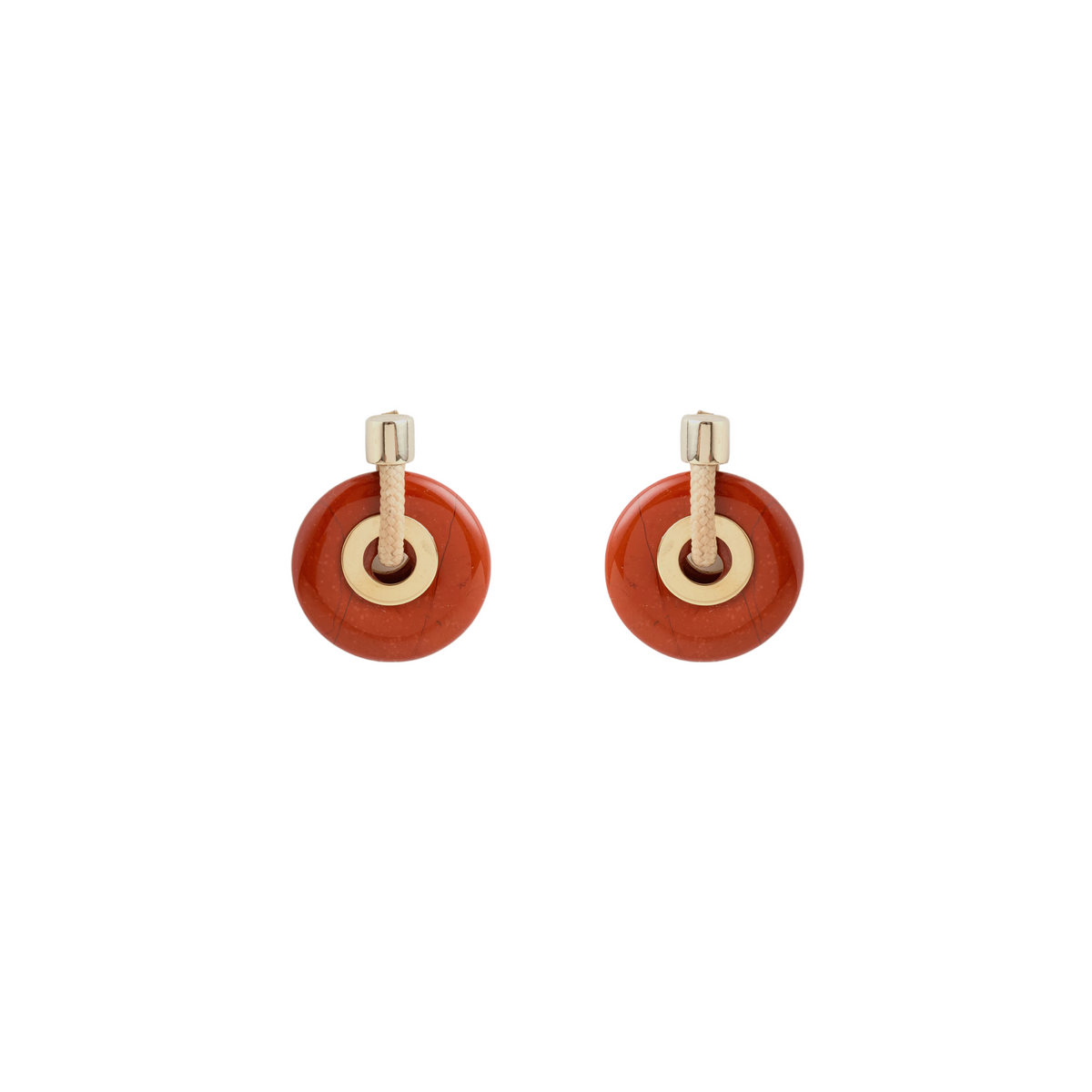 Gold earrings with red beads on a white background
