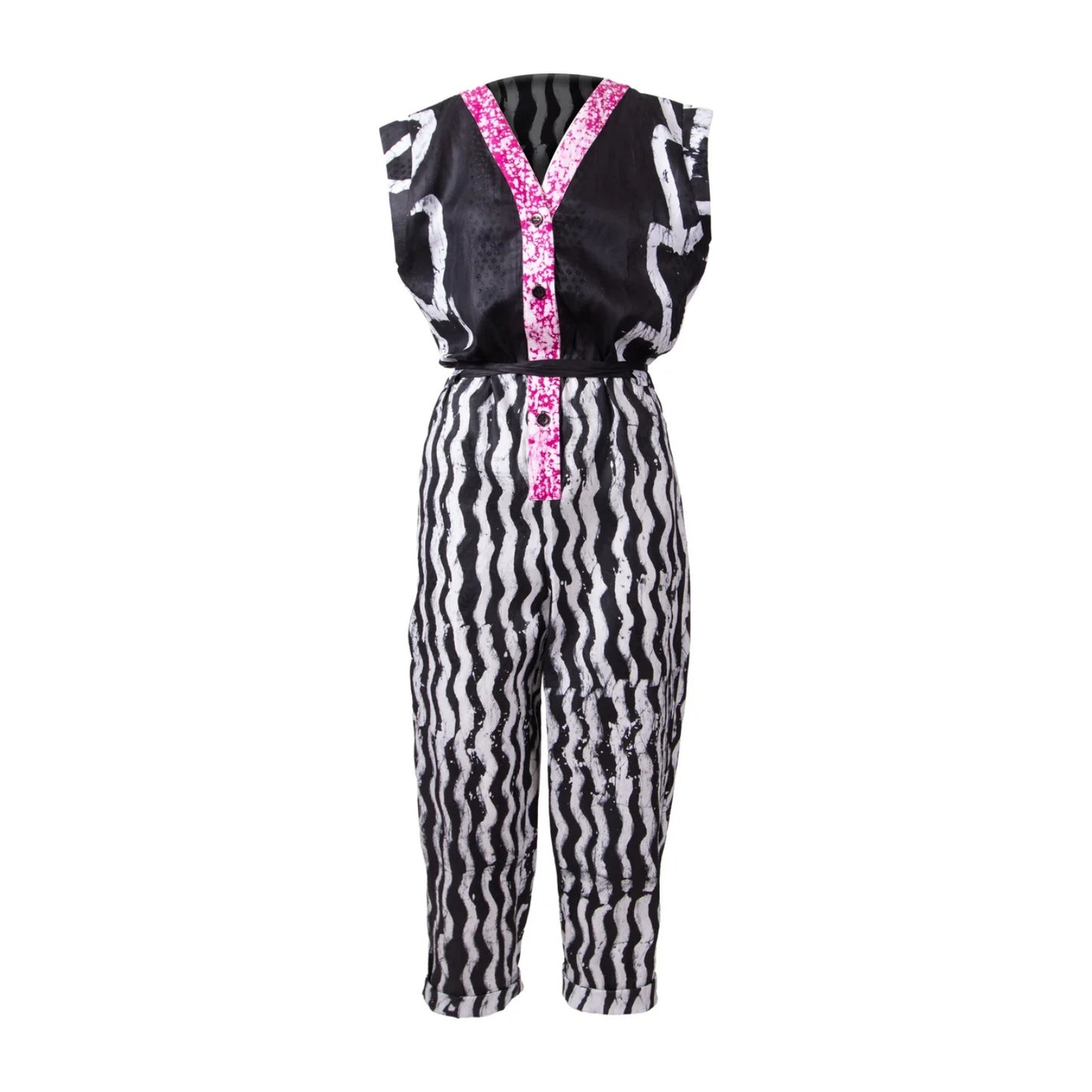 A sleeveless one-piece costume jumpsuit featuring a black and white wavy zebra print, with a bright pink patterned V-neckline and button detail on a white background.
