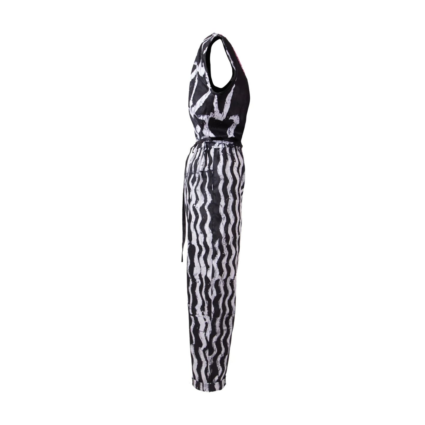 A sleeveless halter-neck jumpsuit with a black and white wavy abstract pattern, shown from the back against a plain white background.