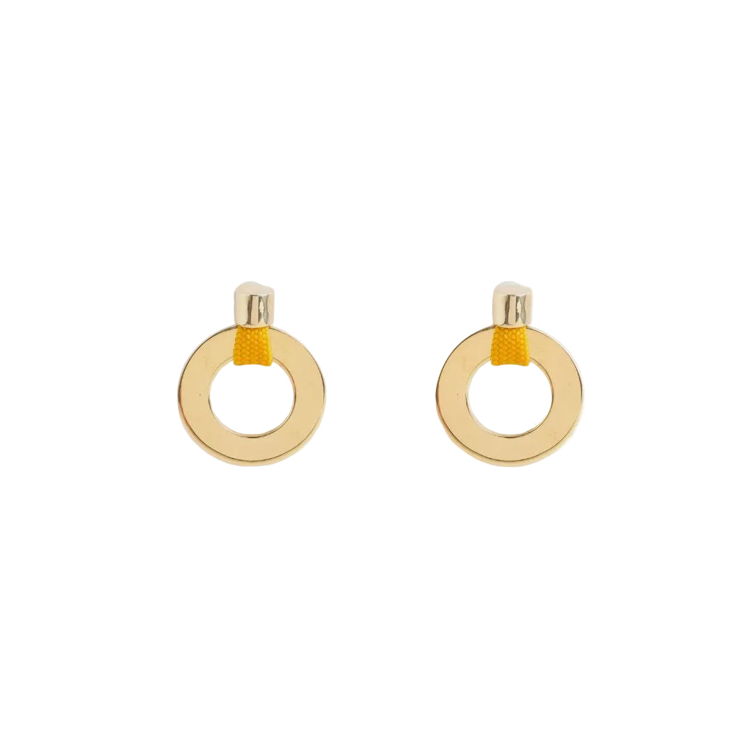 Gold hoop earrings with yellow accents on a white background