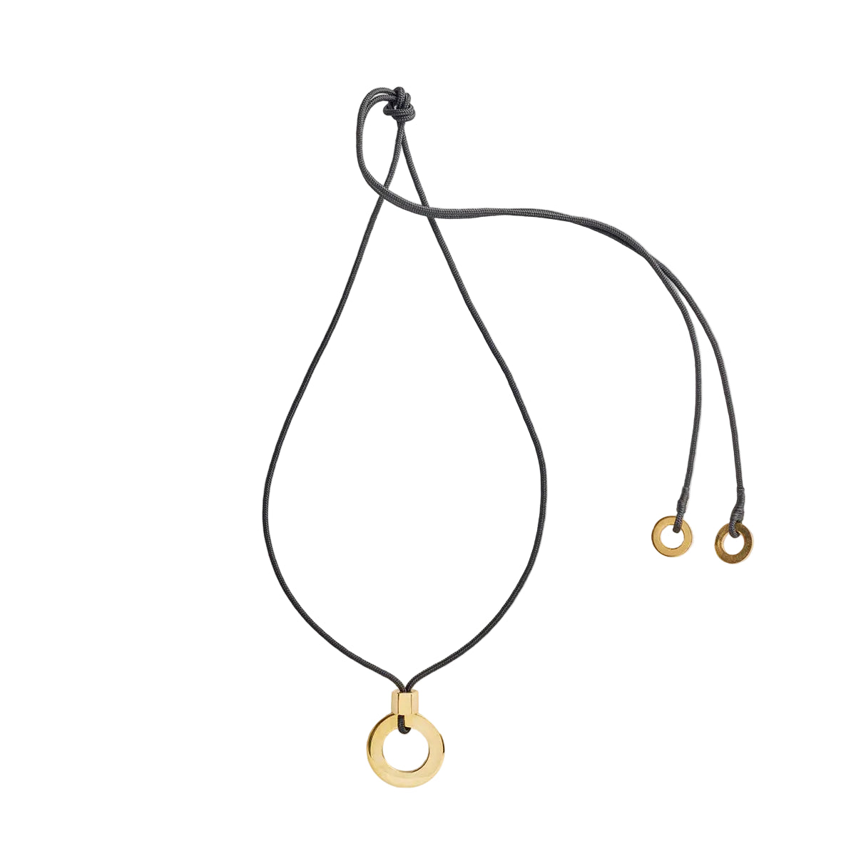 A black rope necklace with a brass and obsidian pendant, with brass disc caps on a white background.