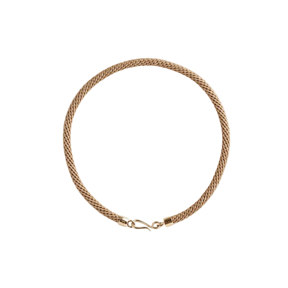 Woven beige necklace with gold clasps on a light background