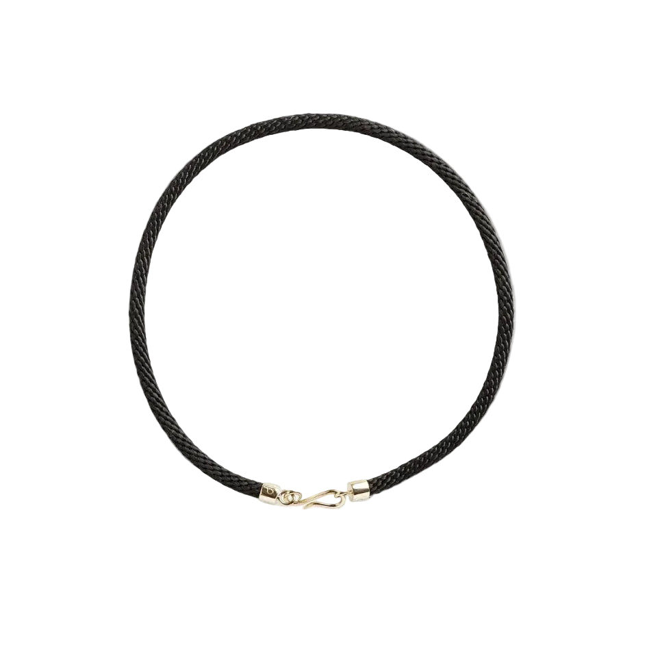 Black rope necklace with a gold clasp.