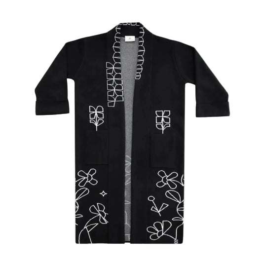A black open-front Long coat, featuring white line-art floral and geometric embroidery.
