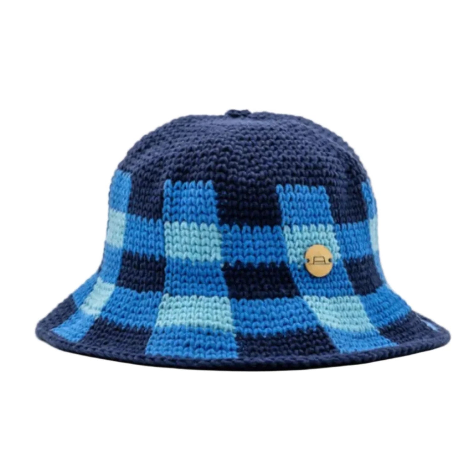 A blue and navy plaid knit bucket hat with a small circular gold button on the side.