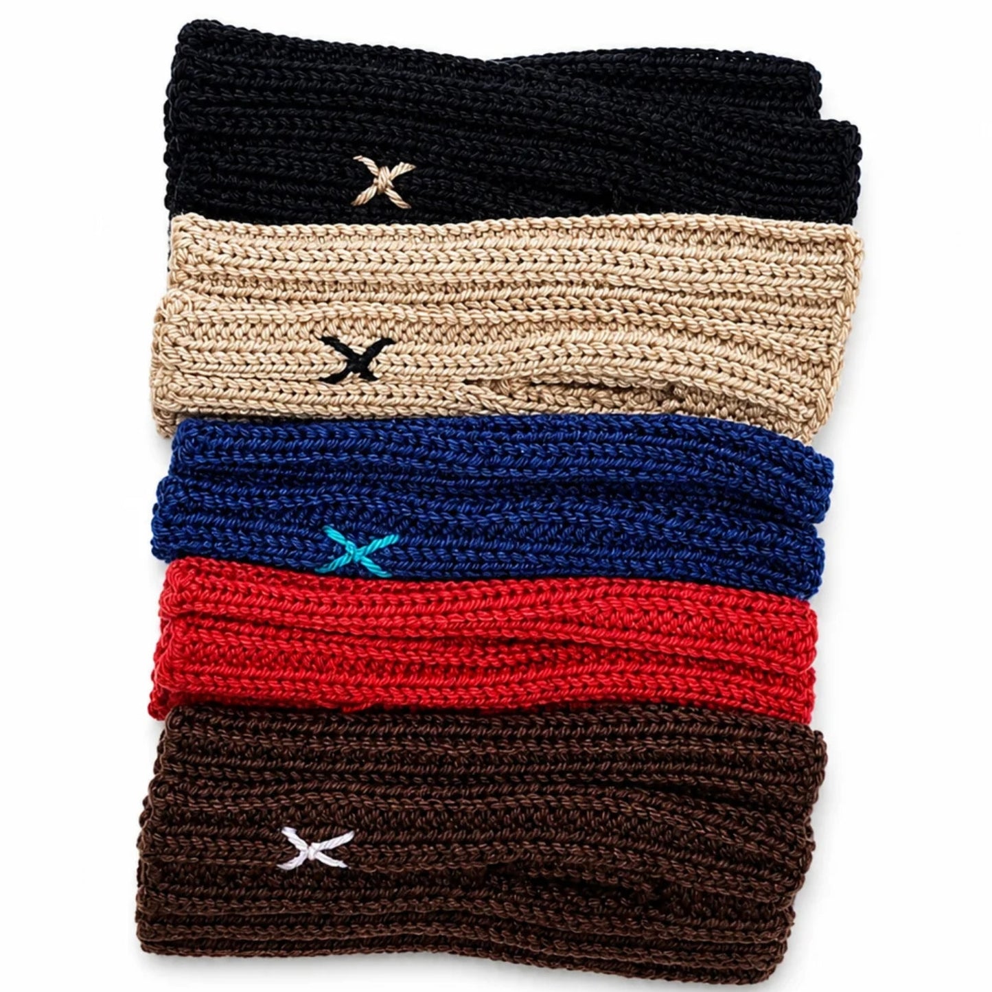 Six stacked knit headbands in black, beige, blue, red, and brown, each with a small embroidered X logo in a contrasting color, on a white background.