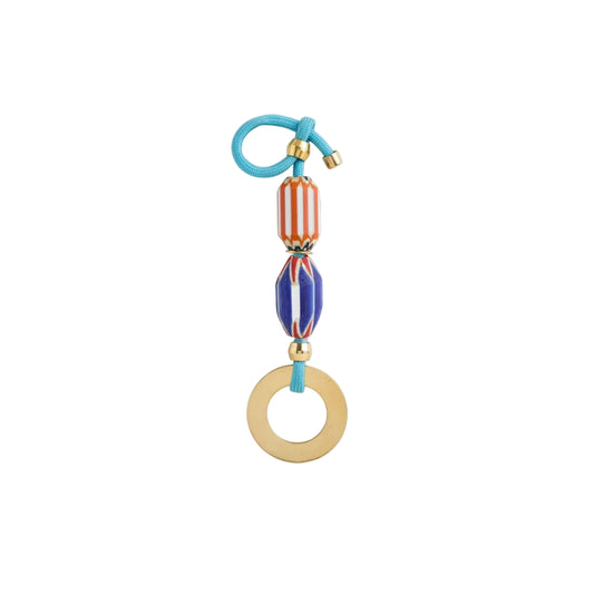 Colorful keychain with geometric design on a white background