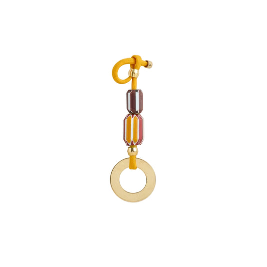 Gold and brown beaded keychain on a white background