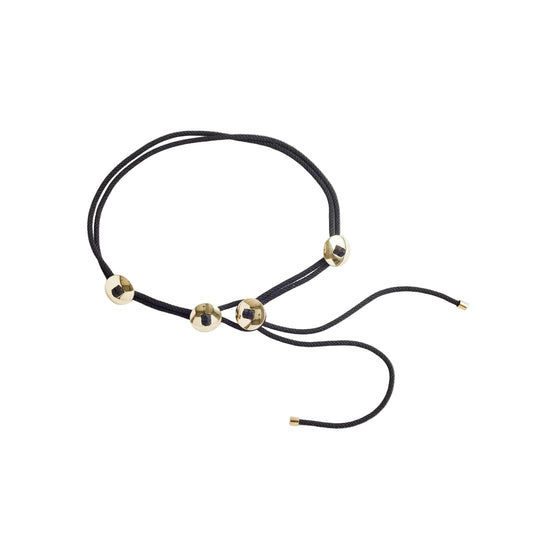 Black cord belt with gold beads on a white background