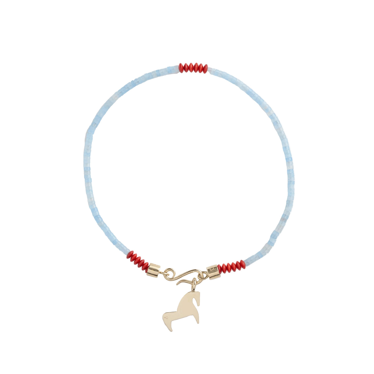 Necklace with red beads and a gold charm on a light blue cord against a white background